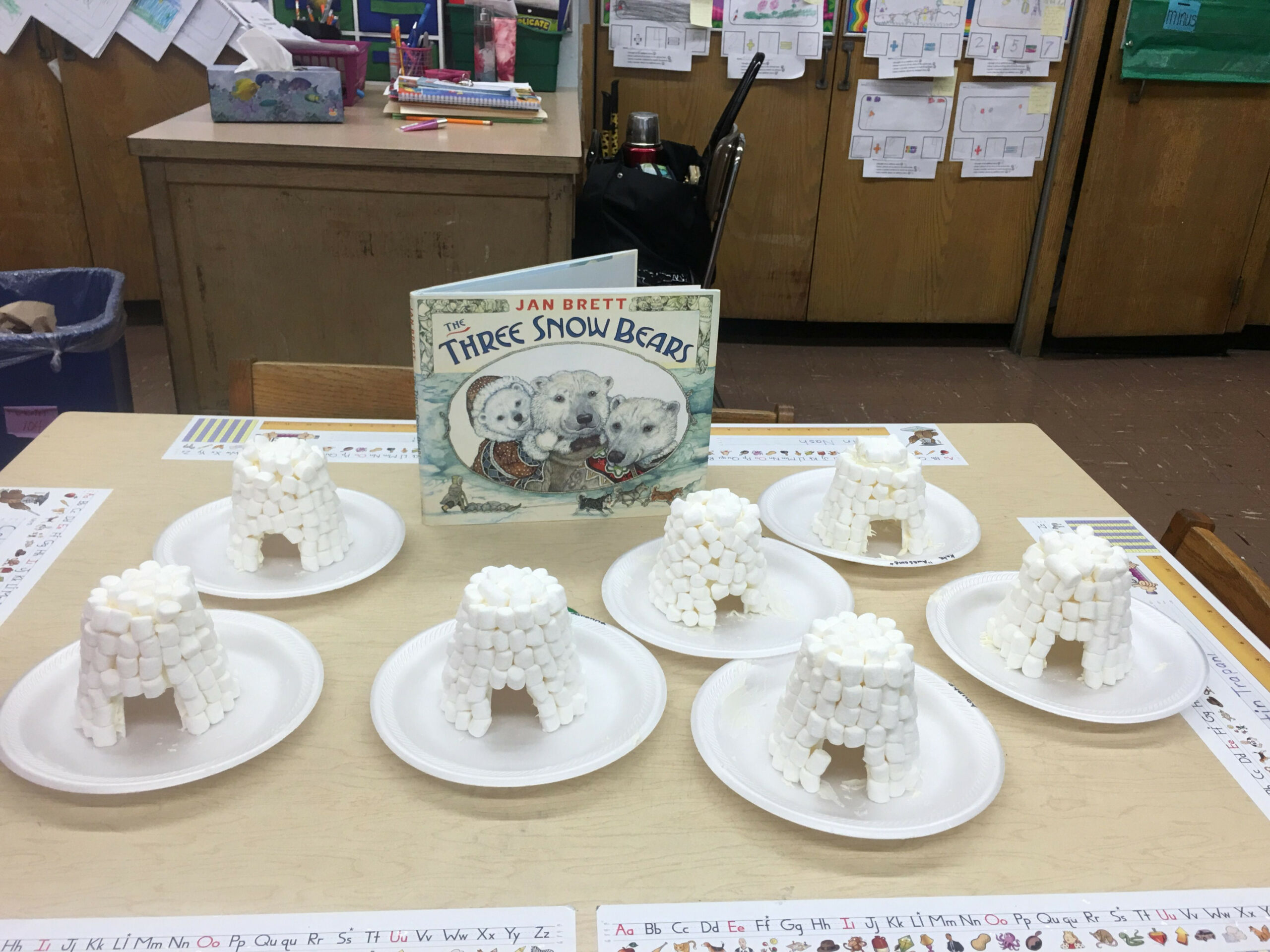 We read The Three Snow Bears by Jan Brett and created edible